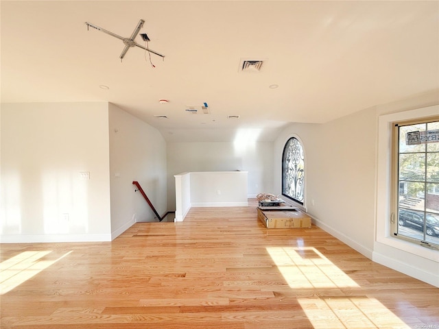 unfurnished living room featuring light hardwood / wood-style floors