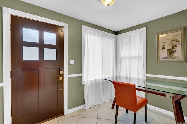 foyer with light tile patterned flooring