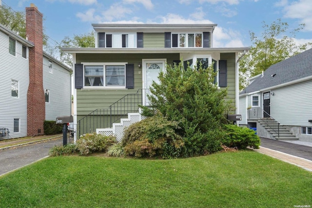 view of front of house with a front yard