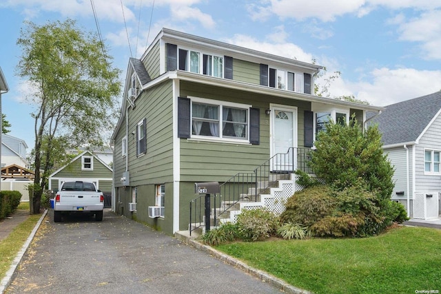 view of front of house with a front lawn