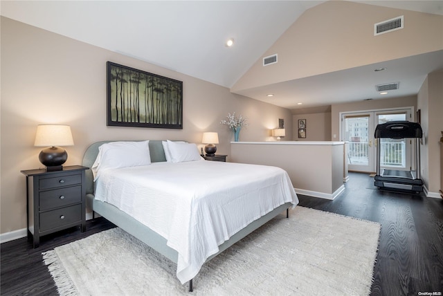 bedroom featuring high vaulted ceiling and dark wood-type flooring