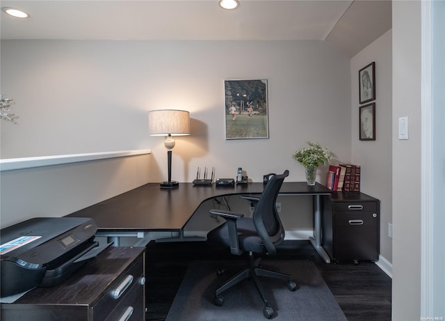 office with dark hardwood / wood-style flooring and lofted ceiling