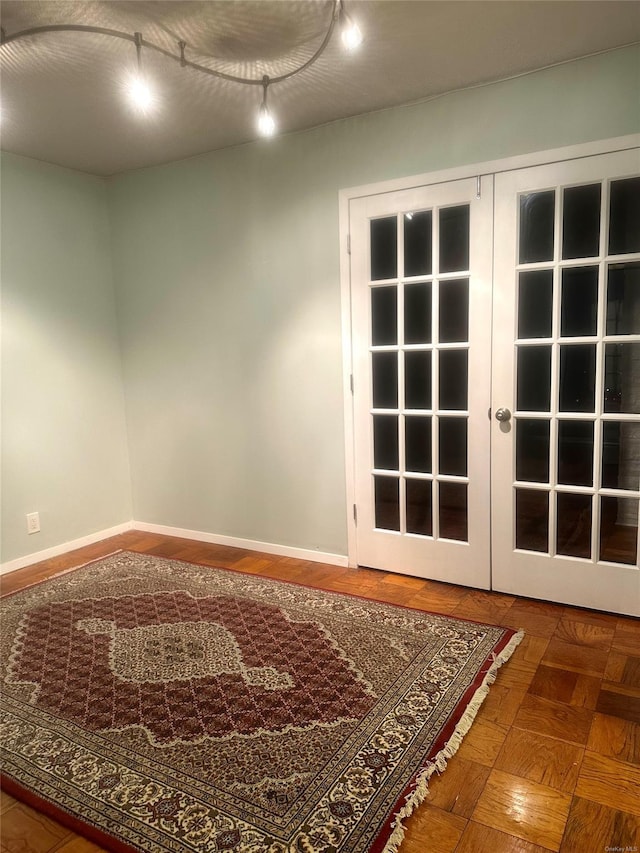 empty room featuring french doors