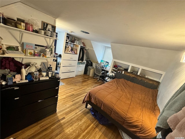 bedroom with light wood-type flooring