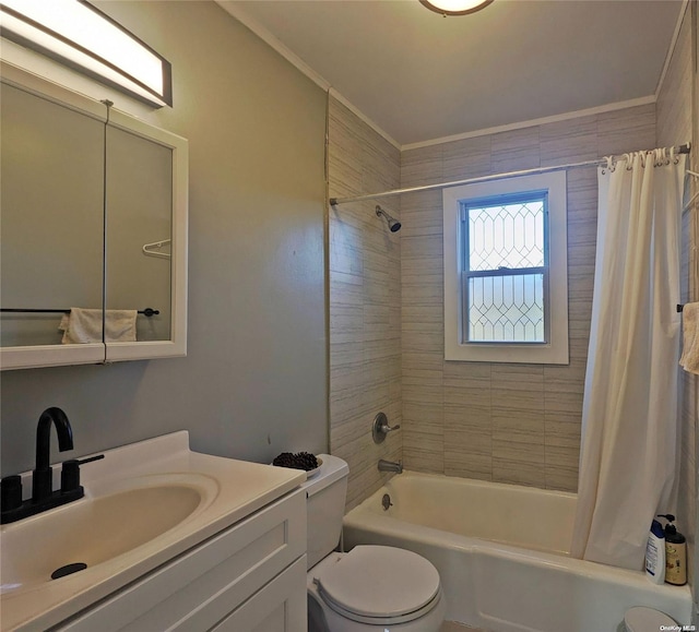 full bath with vanity, toilet, and shower / tub combo with curtain