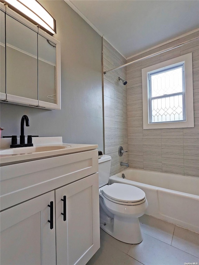 bathroom with tile patterned flooring, shower / tub combination, toilet, and vanity