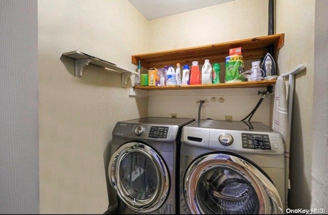 laundry area featuring independent washer and dryer