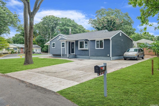 ranch-style home with a front yard