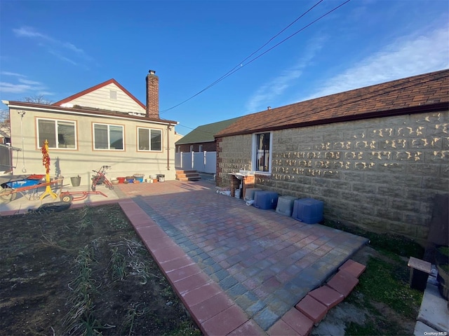 rear view of house with a patio