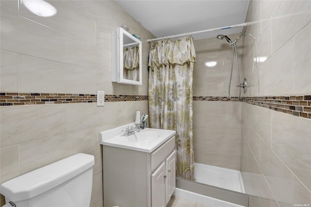 bathroom with a shower with curtain, vanity, toilet, and tile walls