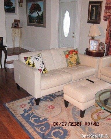 living room with hardwood / wood-style flooring