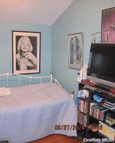 111 President St, Hempstead, NY 11550 - bedroom featuring vaulted ceiling