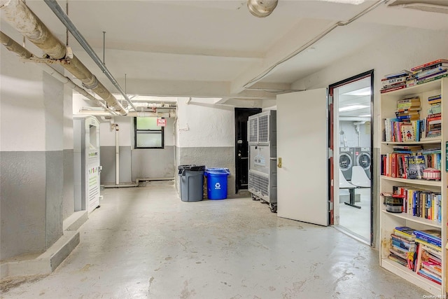 basement featuring washing machine and dryer