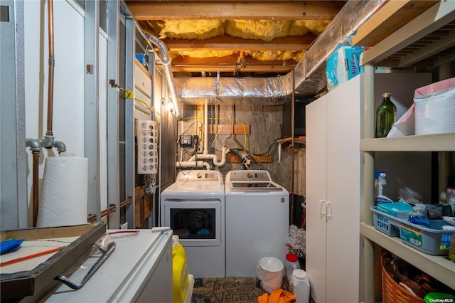 laundry area featuring washing machine and dryer