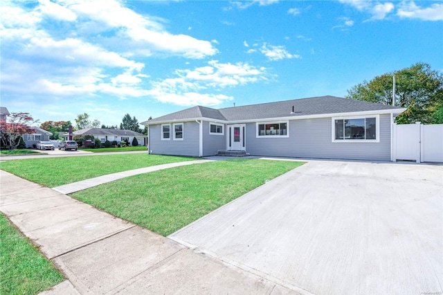 single story home with a front lawn