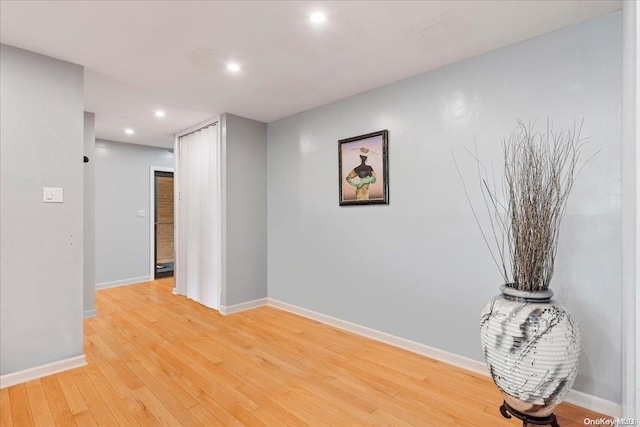 hallway featuring light wood-type flooring