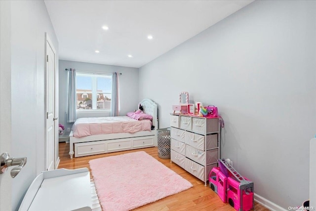 bedroom with light hardwood / wood-style floors