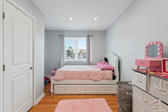 bedroom featuring light hardwood / wood-style floors