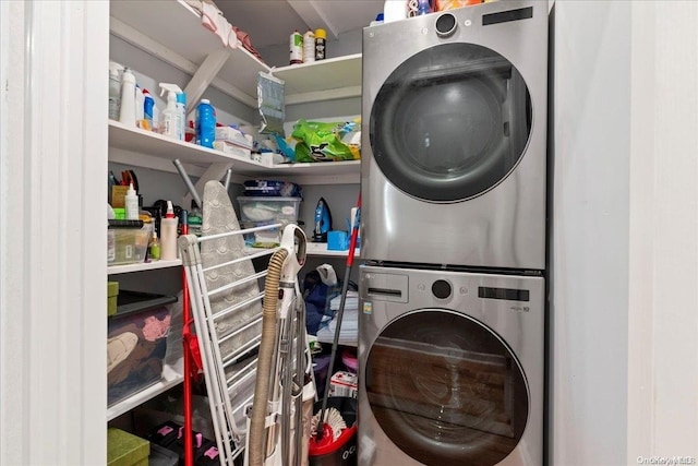 washroom with stacked washer / dryer