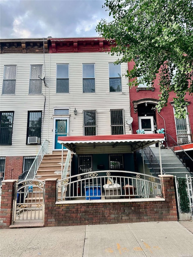 view of front of property featuring cooling unit