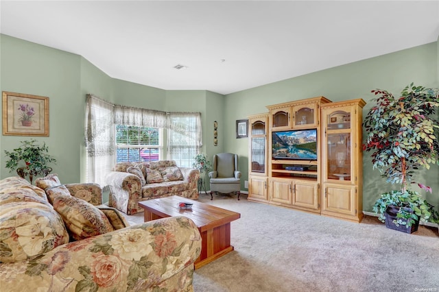 living room featuring light colored carpet