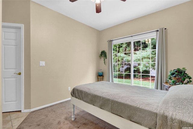 bedroom with light tile patterned floors and ceiling fan