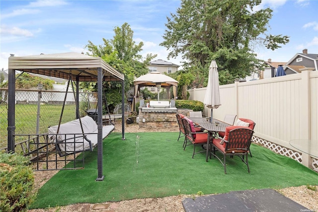 view of patio with a gazebo and area for grilling