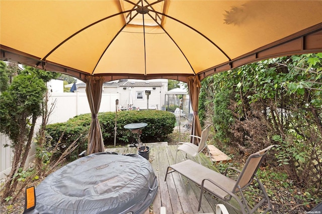 view of patio / terrace featuring a gazebo and a deck