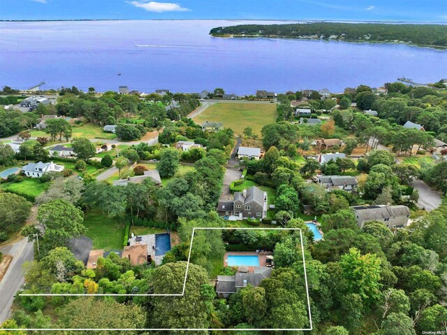 19 Oceanview Rd, Hampton Bays, NY 11946 - aerial perspective of suburban area with a nearby body of water and property parcel outlined