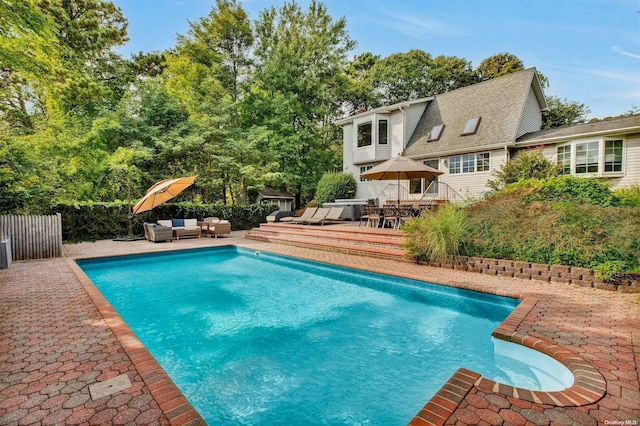 19 Oceanview Rd, Hampton Bays, NY 11946 - outdoor pool featuring an outdoor living space, a patio area, view of scattered trees, and outdoor dining area
