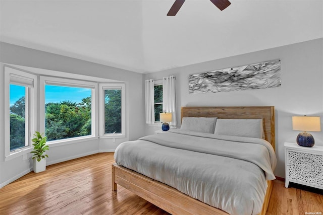 bedroom featuring light hardwood / wood-style floors and ceiling fan