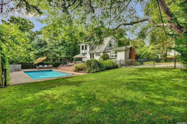 exterior space with a wooden deck, a yard, and a patio