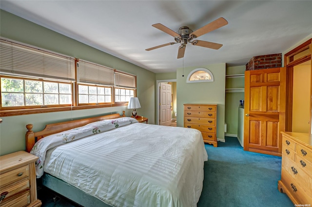 carpeted bedroom featuring ceiling fan