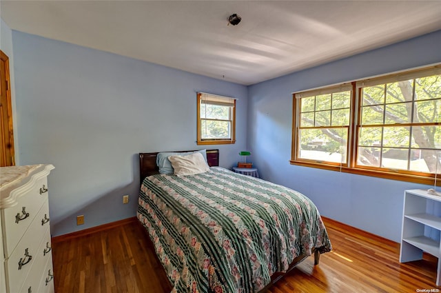 bedroom featuring hardwood / wood-style floors