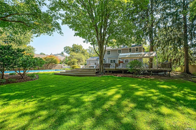 view of yard featuring a pool side deck