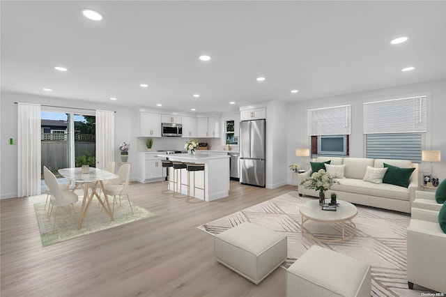 living room with light hardwood / wood-style floors