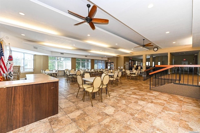 dining room featuring ceiling fan