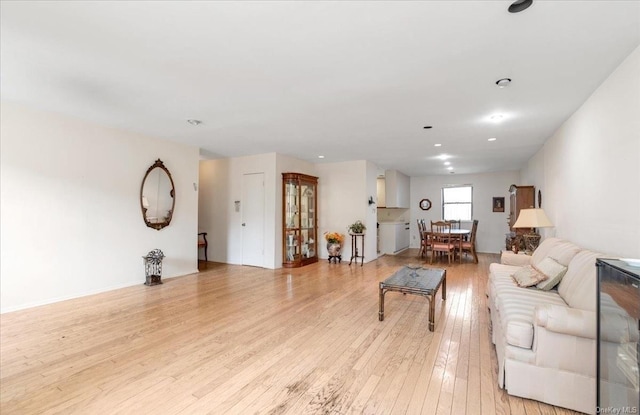 living room with light hardwood / wood-style floors