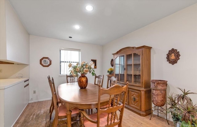 dining space featuring light hardwood / wood-style floors