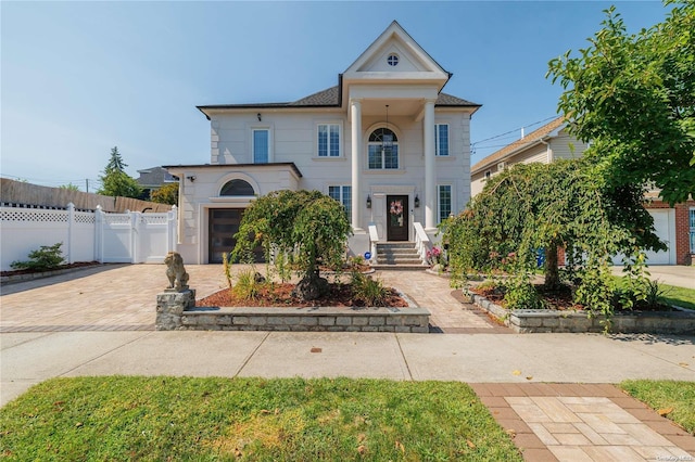 26-44 211th St, Bayside, NY 11360 - neoclassical home featuring decorative driveway
