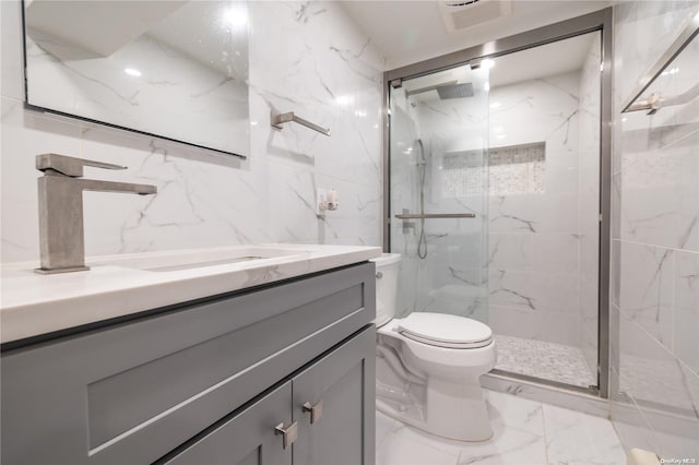 26-44 211th St, Bayside, NY 11360 - full bath with vanity, marble finish flooring, toilet, and a marble finish shower