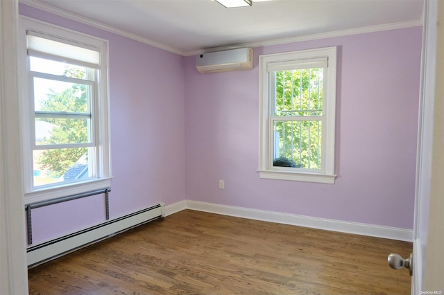 unfurnished room featuring a wall mounted AC, a wealth of natural light, baseboard heating, and wood-type flooring