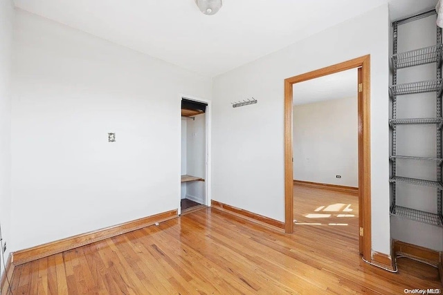 unfurnished room featuring light wood-type flooring