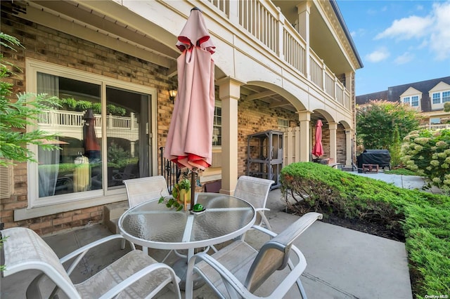 view of patio / terrace featuring a balcony and grilling area