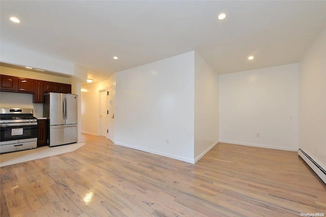 kitchen featuring baseboard heating, dark brown cabinetry, stainless steel appliances, and light hardwood / wood-style floors