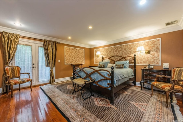 bedroom featuring access to exterior, crown molding, french doors, and wood-type flooring