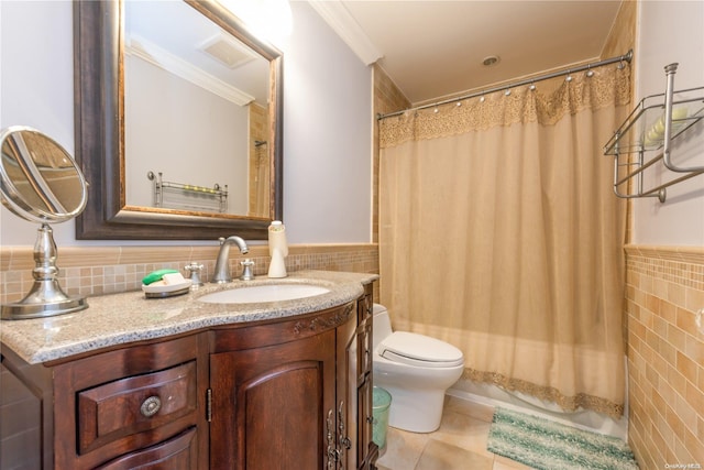 full bathroom featuring tile patterned floors, vanity, tile walls, and toilet