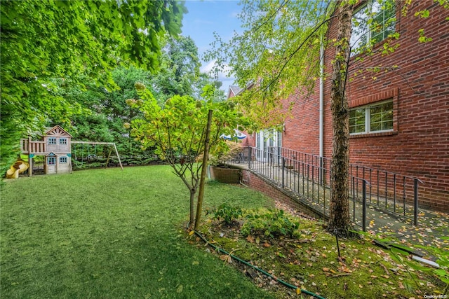 view of yard featuring a playground