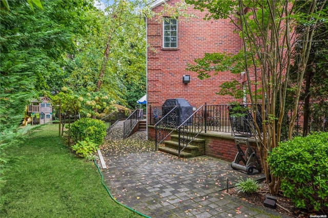 rear view of house with a patio