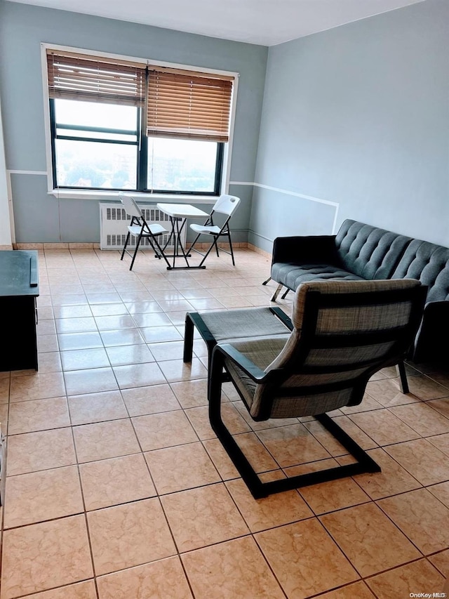 sitting room with light tile patterned floors